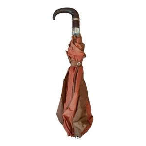 Vintage brown rusty orange compact umbrella with plastic hook handle